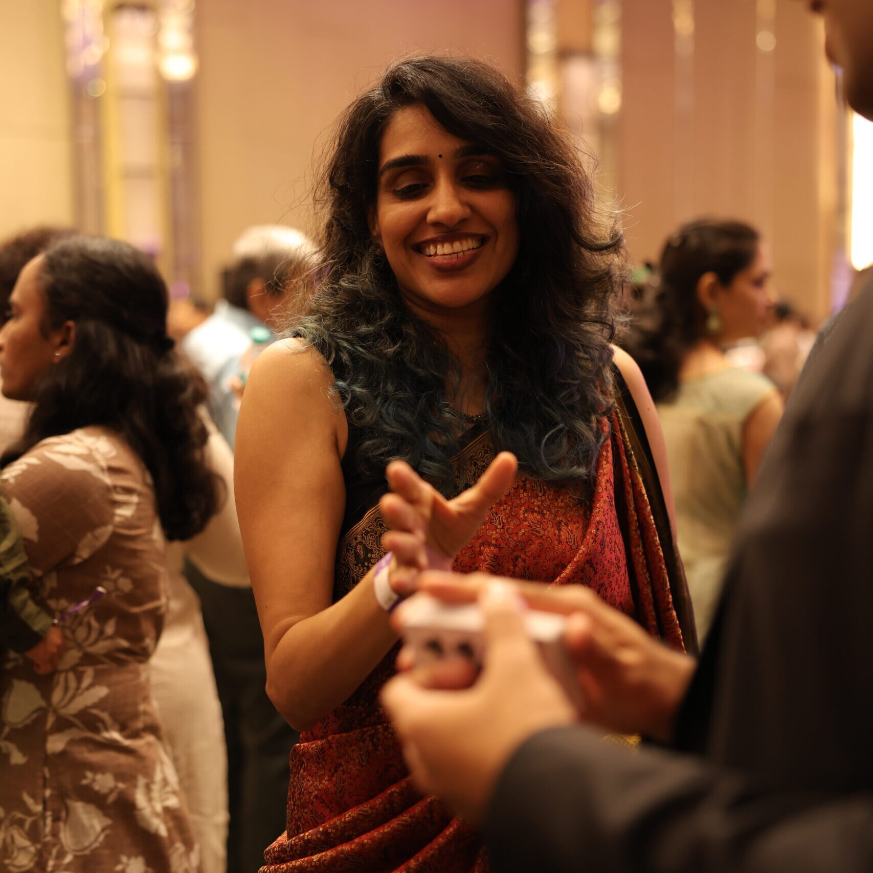 Corporate Mentalist in India Photograph from an Event Corporate Mentalist entertaining a lady with playing cards