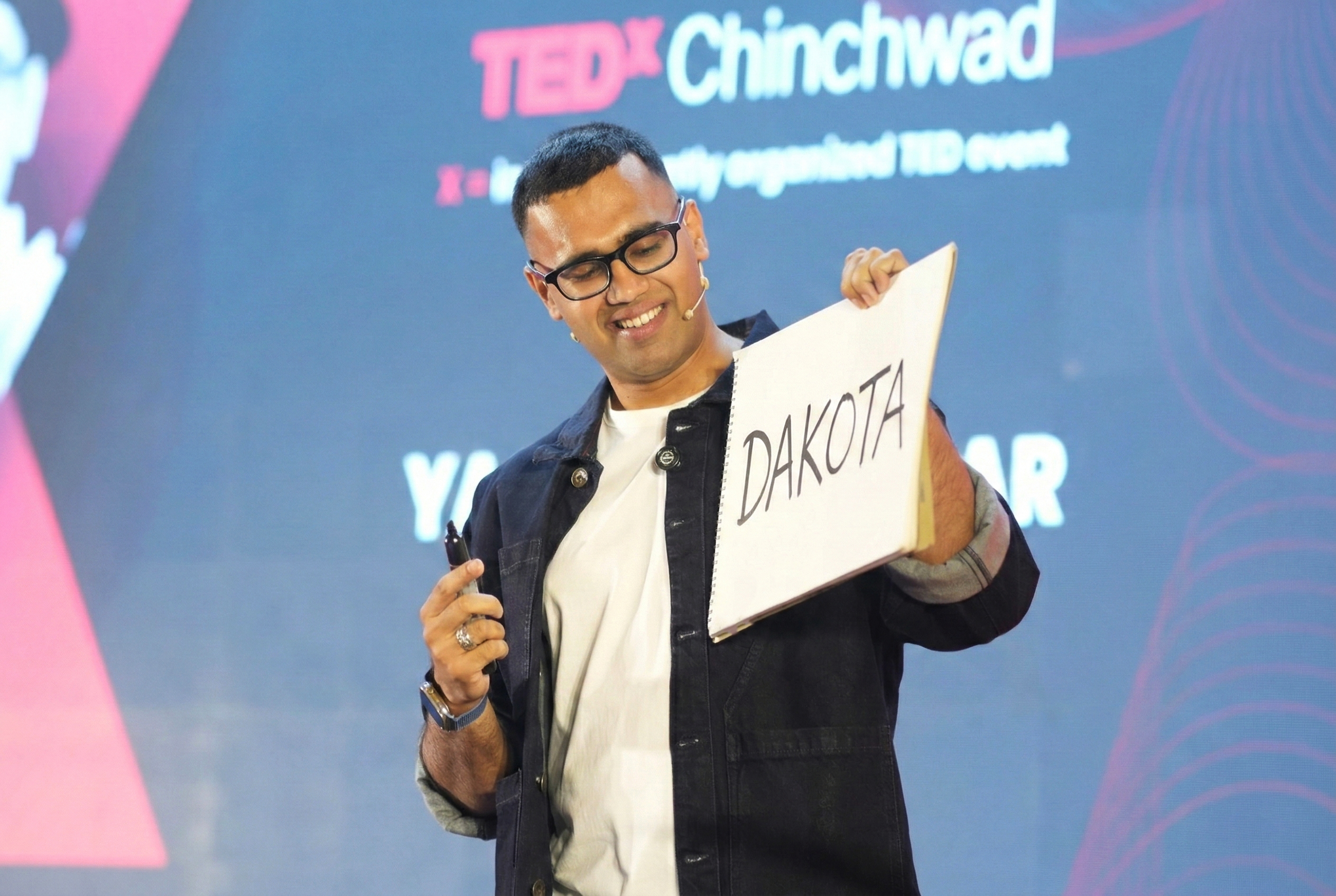 Yash Pataskar performing on the TEDx Stage Yash Pataskar reading minds of participants on stage in PCMC