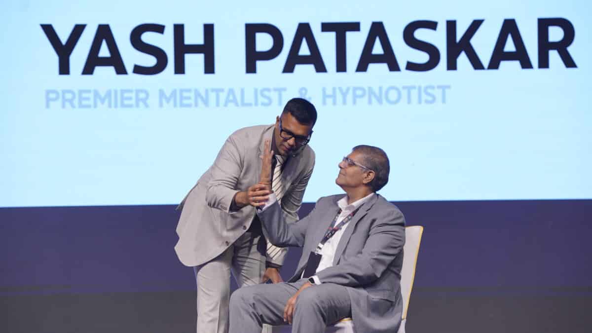 Premier Mentalist & Hypnotist: Yash Pataskar 10 Mentalist hypnotising a participant on Stage - Stage Mentalist - Entertainment Corporate